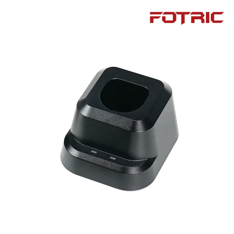 Black triangular object on a white background with 'FOTRIC' branding.